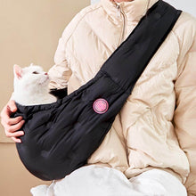 Load image into Gallery viewer, Person Holding Cat in Black Arkika Cat Sling Bag | MissyMoMo
