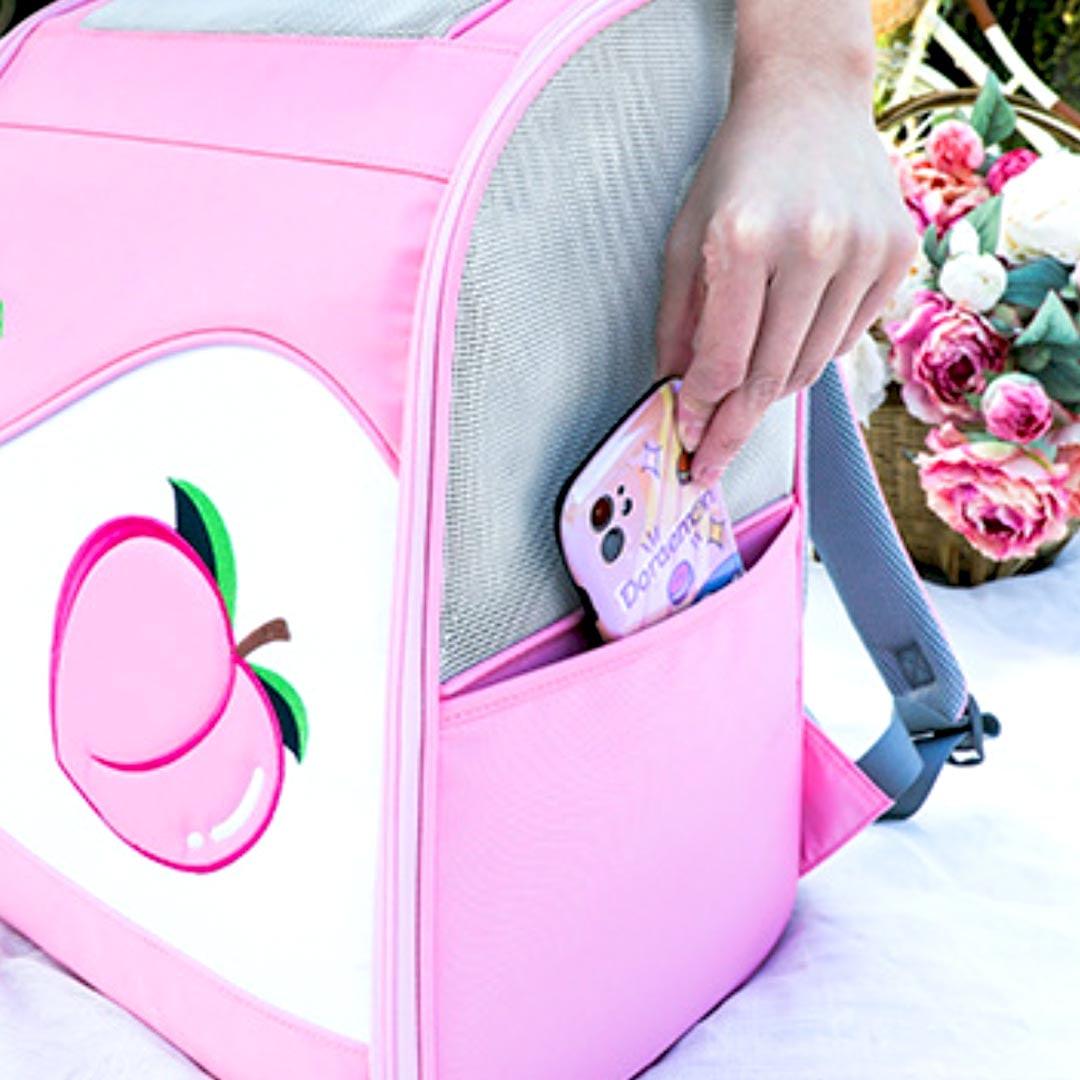 Placing Phone Into Side Pocket of Pink Arkika Travel Cat Backpack | MissyMoMo