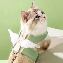 Load image into Gallery viewer, Cat Wearing Avocado Angel Wings Harness Looking Up | MissyMoMo

