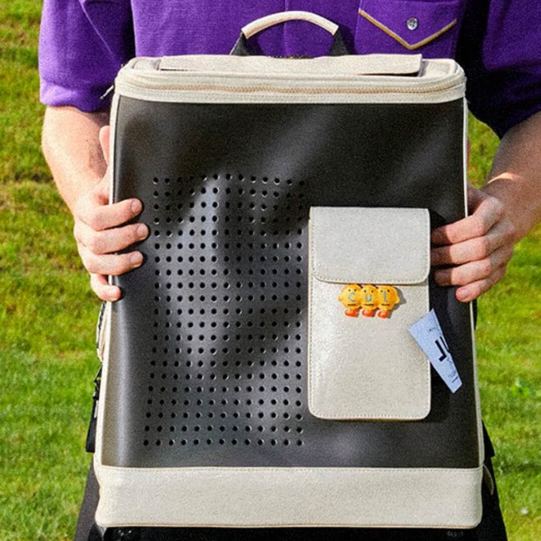 Person Holding Black & White Cat Carrier Backpack | MissyMoMo