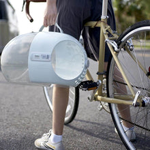 Load image into Gallery viewer, Person Holding Transparent Moboli Capsule Cat Carrier | MissyMoMo
